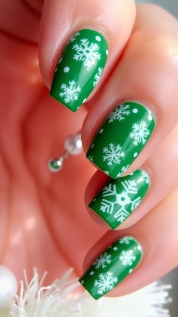 Close-up of green Christmas nails with white snowflakes on a festive background.